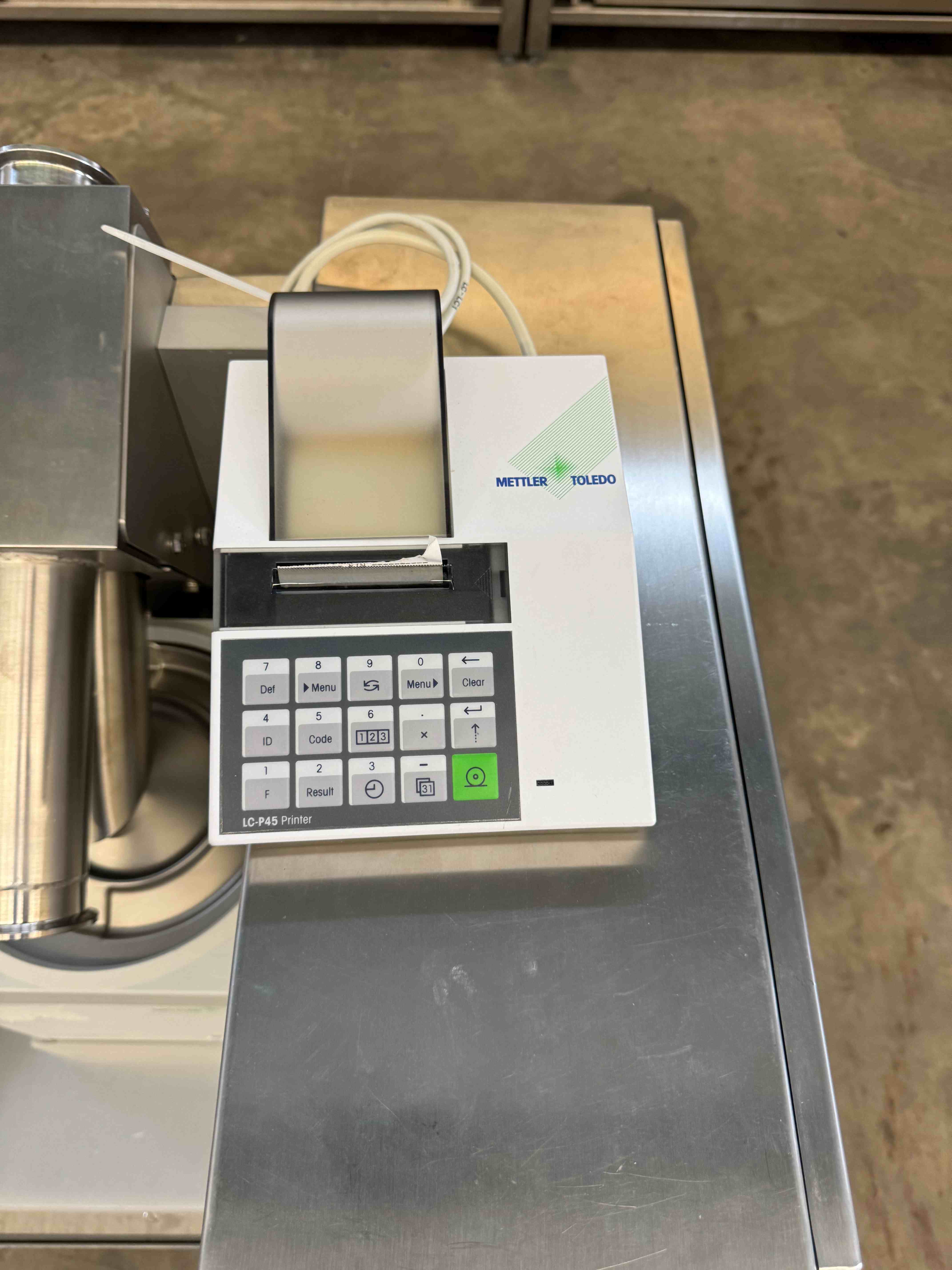 Vollautomatische Kapselwiege-Einheit 5